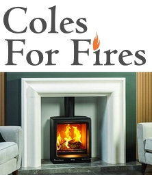 a stove in a marble firesurround. Coles for fires in Kettering Northamptonshire