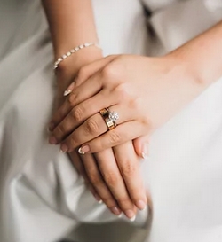 close up of ladies hands wearing a wedding band. jewellery in northampton, Brixworth