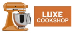 an orange food mixer and a logo for Luxe Cookshop in Kingsthorpe 
Northampton