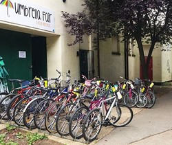 a row of refurbished bicycles, Umbrella fair in Northampton bicycle sales