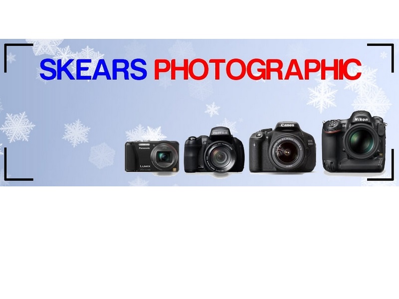 Logo showing four cameras in the sky, Skears photography shop on Wellingborough road Northampton