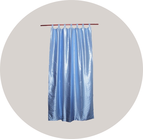 a blue curtain hanging from a curtain pole