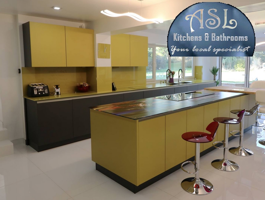 a kitchen with ochre coloured units, a kitchen island, and bar stools