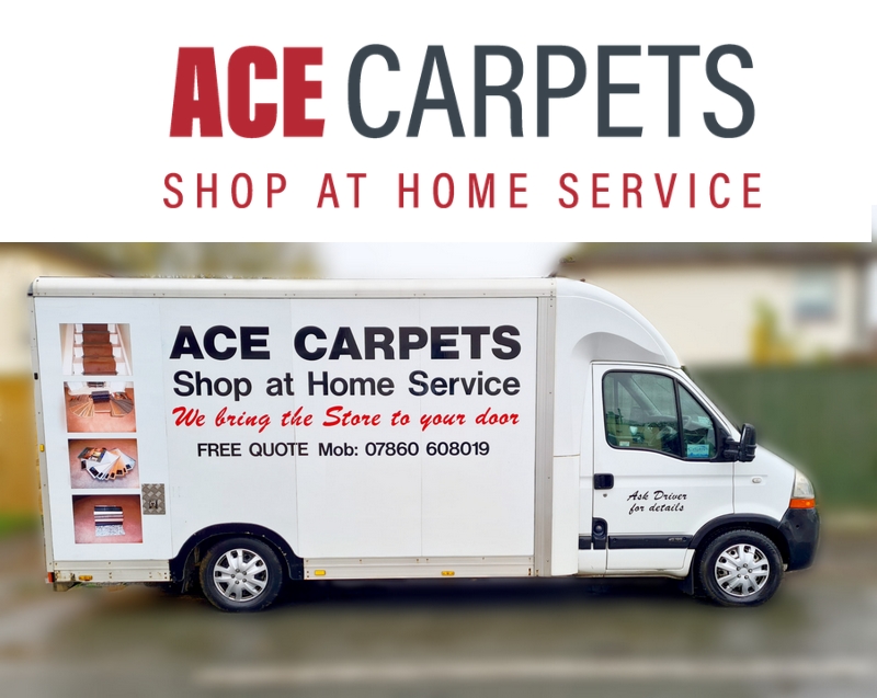 a white signwritten van with black and red signwriting. Ace carpets in Corby, Northamptonshire