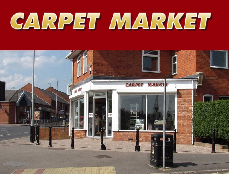 an image of a shop on a corner. Carpet market. Carpets in Northampton.