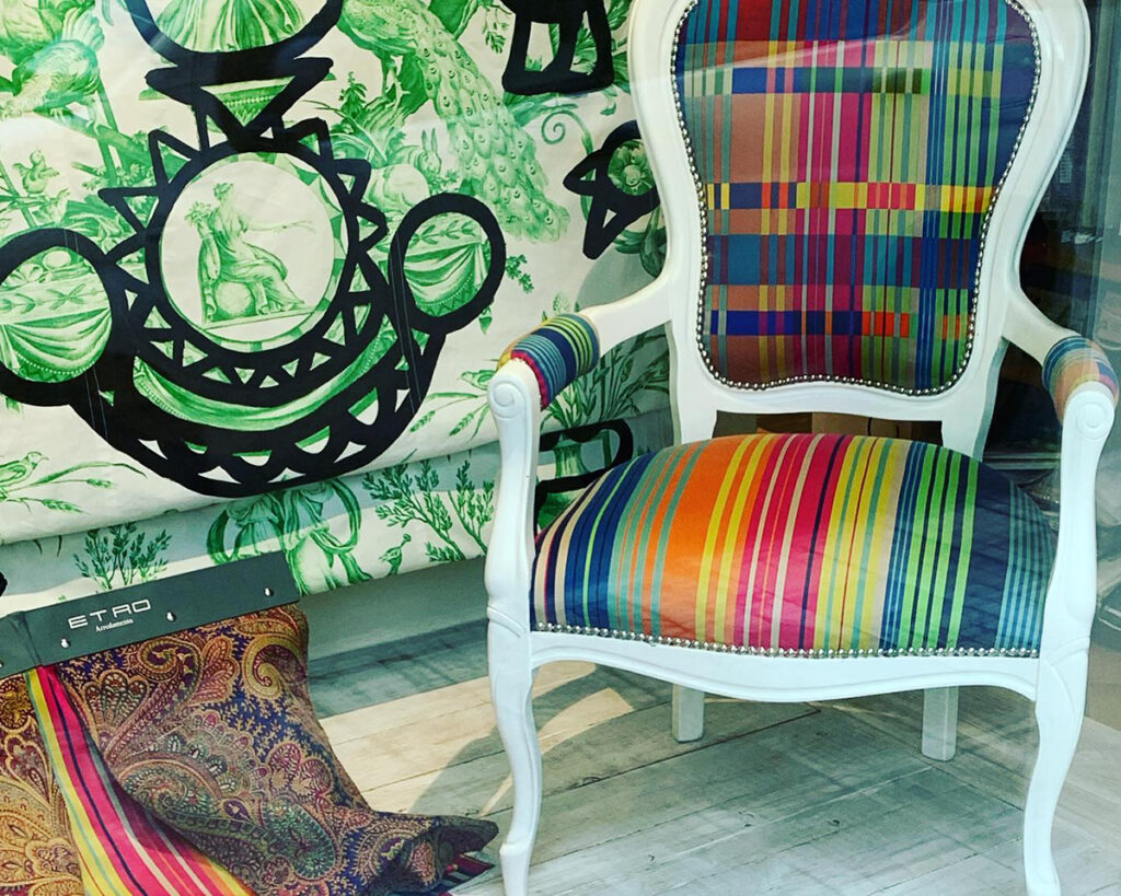 a very colourful chair, upholstered.